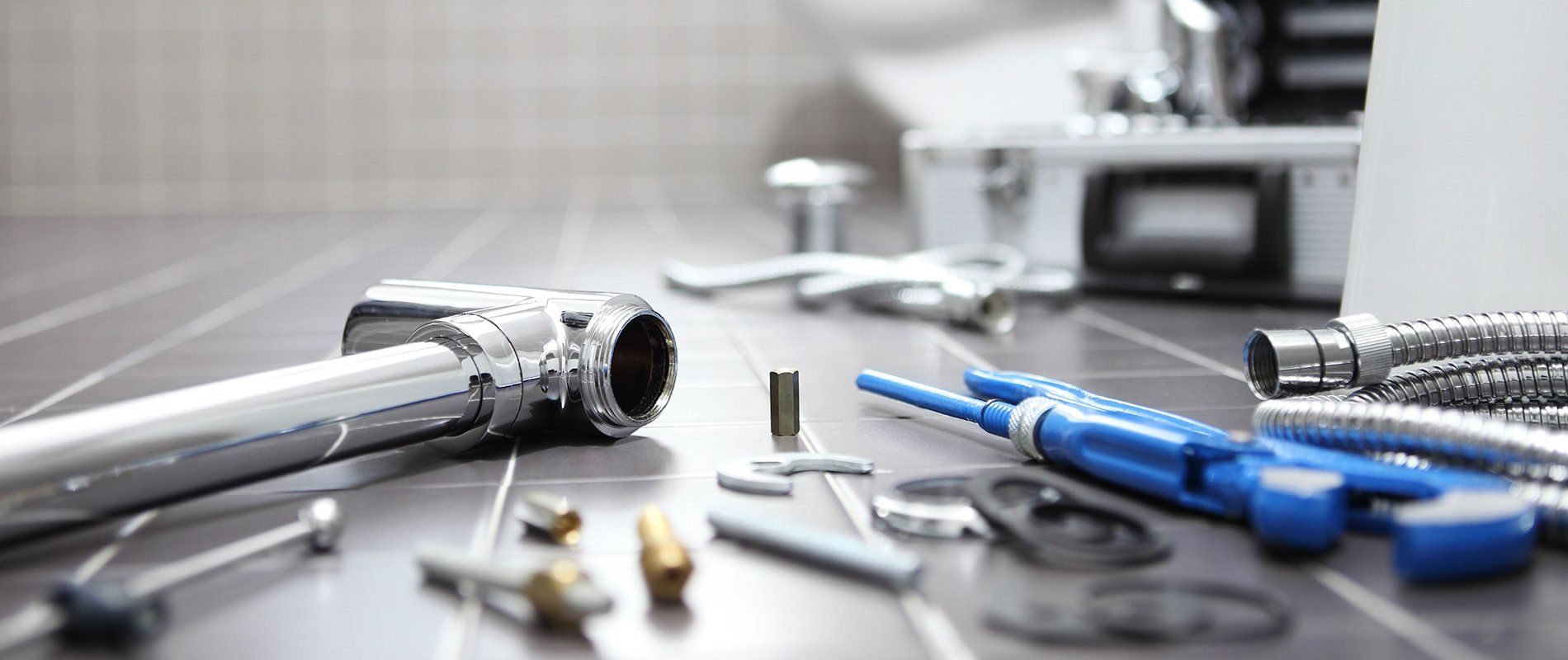 A Plus Plumbing Services plumber at work in Sarasota County